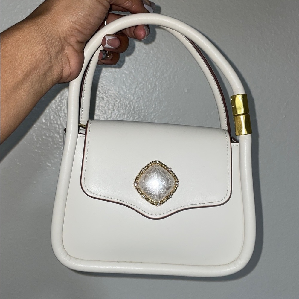 Elegant White Handbag with Gold Accents